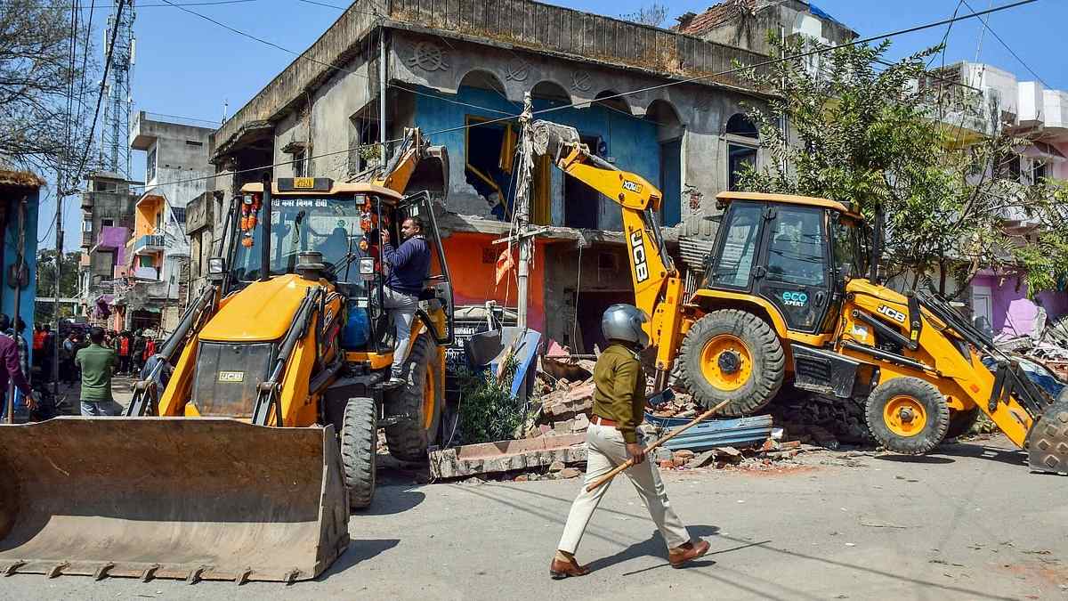 madhukam bulldozer action