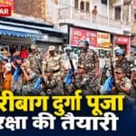 हजारीबाग के दुर्गा पूजा पंडाल पर तैनात पुलिसकर्मी और मौजूद श्रद्धालु